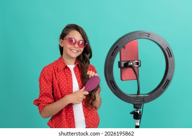 Cheerful Teen Girl Use Selfie Led. Kid Beauty Blogger. Haircare. Child In Sunglasses Combing Hair.