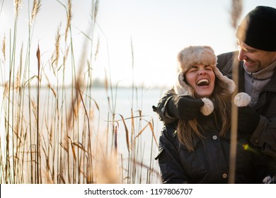 Cheerful Winter Couple Spending Quality Time Together