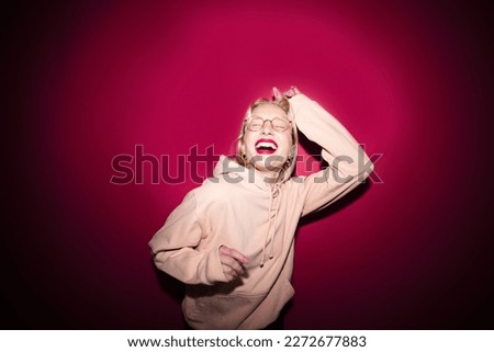 Similar – Young stressed woman wearing rabbit ears