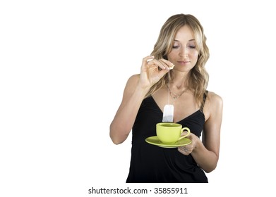 Cheerful Woman Dipping Tea Bag