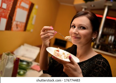 Cheerful Woman Eating Pie