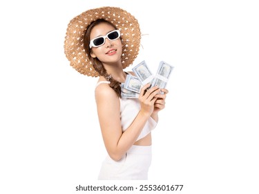 A cheerful woman in a sunhat smiling and holding money, representing success and happiness. - Powered by Shutterstock