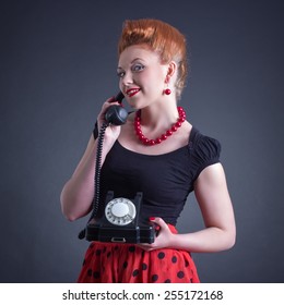 Cheerful Woman Talking On Land Line Phone. Photo In Retro Style