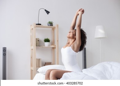 Cheerful Woman Is Waking Up