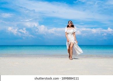 white dress for beach photoshoot