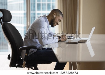 Similar – Image, Stock Photo Side view of focused female hairstylist using electric trimmer on male client’s hair at salon