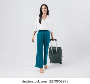 Cheerful young Asian woman holding suitcase with walking to the front, isolated on white background. Concept tourist holiday trip. - Powered by Shutterstock