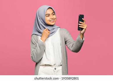 Cheerful Young Asian Woman Looking Happy In Video Call In Mobile Phone