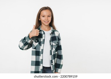 Cheerful Young Caucasian Preteen Schoolgirl Daughter Showing Thumb Up Positive Good Attitude Isolated In White Background