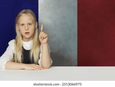 Cheerful young child girl an French flag background. Education in France and study French language concept - Powered by Shutterstock