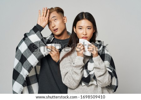 cheerful young couple asian appearance luxury lifestyle