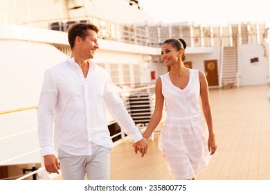 Cheerful Young Couple Walking On Cruise Ship