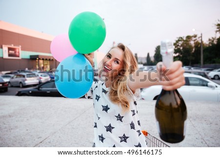 Similar – Image, Stock Photo Young blonde woman holding orange leaf