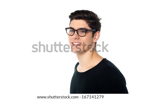 Similar – Portrait of a smiling Caucasian man in his 20s wearing a sweatshirt against a dark background.