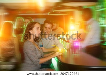 Similar – Image, Stock Photo Young business people on the roof terrace at the Afterwork Beer