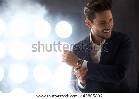 Cheerful young model in the night club