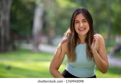 Cheerful Young Turkish Woman Portrait While She Is Laughing