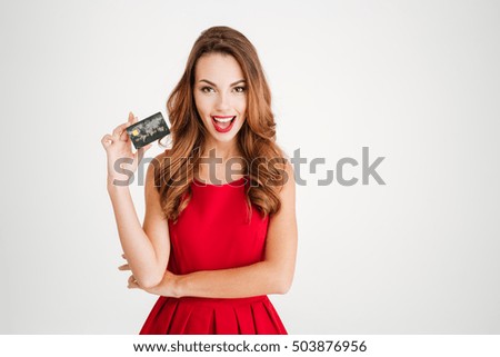 Similar – Image, Stock Photo Beautiful woman holding a DC CCS2 EV charging connector on a Hypercharger or Supercharger for recharge her car.