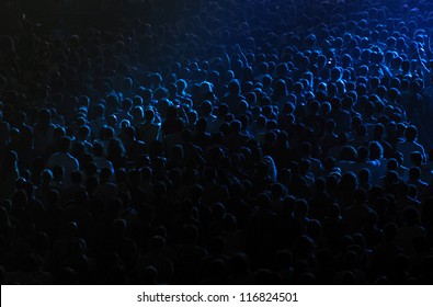 Cheering Crowd At The Rock Concert In A Concert Hall