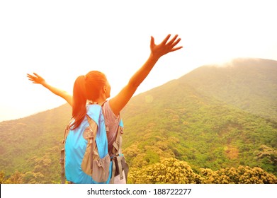 Cheering Hiking Woman Enjoy The Beautiful View At Mountain Peak 