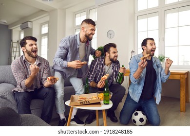 Cheering, Shouting Young Men Watching Exciting Sports Game. Group Of Friends Enjoying World Cup On TV At Home, Eating Pizza And Chips, Drinking Beer And Celebrating Favorite Soccer Team Scoring A Goal