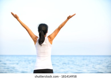 Cheering Woman Open Arms At Seaside