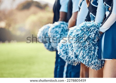 Cheerleader fitness, training and students in cheerleading uniform on a outdoor field. Athlete group back, college sport collaboration and game cheer prep ready for cheering, stunts and pompoms