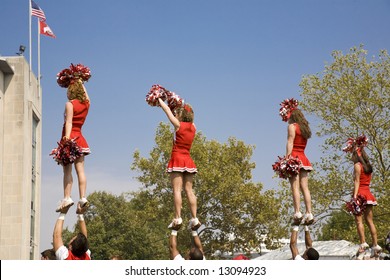Cheerleader Mount At A Pep Rally Before The Ohio State Game