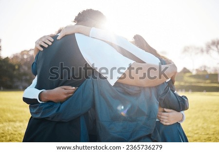 Cheerleader team, group hug and huddle for sports competition support, trust or community motivation. Cheerleading, group solidarity and dancer care embrace, teamwork or contest unity on grass pitch