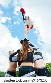 Cheerleaders Making A Pyramid