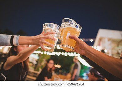 Cheers to the best friends,Group Of Friends Enjoying Evening Drinks,vintage style.