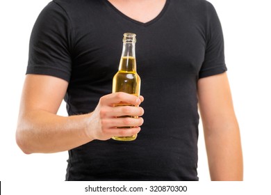 Cheers! Close Up Of Male Hand Holding Bottle Of Beer. Isolated On White.