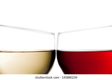 Cheers, Closeup Of Two Glasses Of Red Wine And White Wine Against White Background