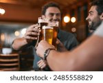 Cheers, friends and beer in pub with glasses as celebration for drinks, happiness or social bonding. Alcohol, men and people in restaurant for birthday party, event and reunion in Germany with toast