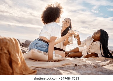 Cheers, friends and picnic on beach with wine with girls, bonding and celebration on holiday or vacation in Bali. People, women and happy with alcohol glass on rocks for relax and summer break - Powered by Shutterstock