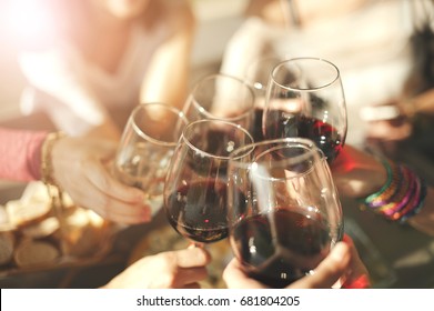 Cheers With Glasses Of Red Wine