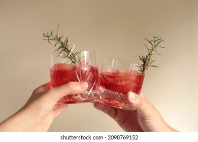 Cheers With Red Cocktail With Ice