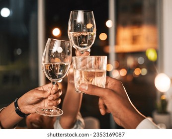 Cheers, wine and glasses with hands and business people at night, celebration of deadline target with collaboration. Alcohol drink, party and winning, toast and overtime with working late and meeting