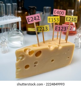 Cheese Adorned With Additive Labels E. Food Laboratory On A Lab Bench.