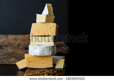 Similar – Image, Stock Photo Different types of cheeses isolated on white background