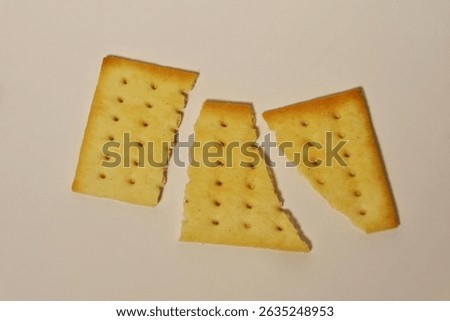 cheese biscuit split in three