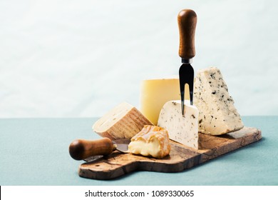 Cheese Board: Variety Of Cheeses On Marble Serving Board