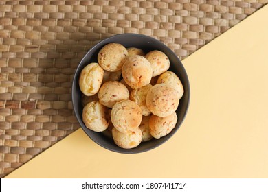 Cheese breads and cassava flour. Traditional from northern Argentina. Yellow and gray background - Powered by Shutterstock