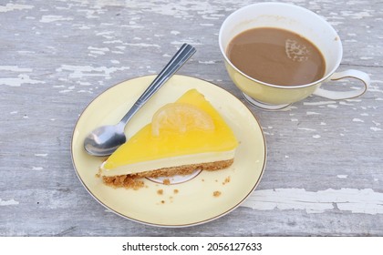 Cheese Cake Lemon And Coffee Cup On White Wood Background