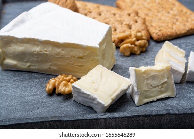 Cheese Collection, Piece Of French Brie Cheese With White Mold Close Up