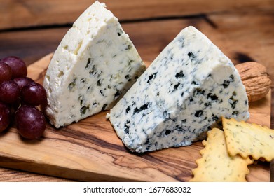 Cheese collection, strong Danish blue cheese Danablu with blue mould close up
