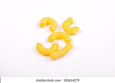 Cheese Curls Isolated On A White Background 