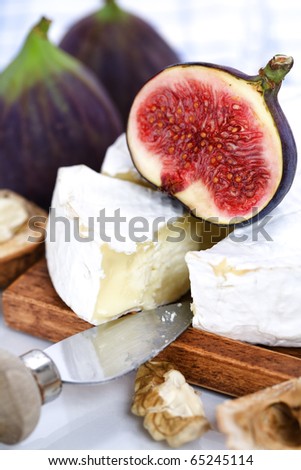 Cheese and figs on a table