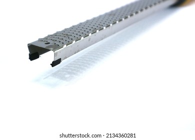 cheese grater, lemon grater, long grater, stailess steel grater on isolated white background. copy space.