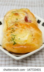 Cheese Ham Danish On Plate.